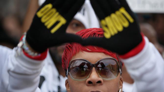 Lesley McSpadden, now known as Lezley McSpadden, mother of Michael Brown, helps lead the Justice for All rally and march against police brutality and the killing of unarmed black men by police Dec. 13, 2014, in Washington, D.C.Chip Somodevilla/Getty Images